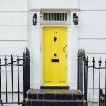 Yellow door to a house