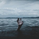 hand above water