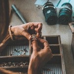 Woman working on jewelry
