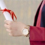 student with diploma