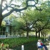 Image of people sitting on a bench at Discovery Green in Houston, Texas