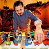 Image of James Rojas and a village built from Legos