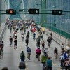 Bikers crossing a bridge in Vancouver