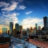 The sunrise behind the Houston skyline