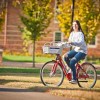 Woman on a bike share bike
