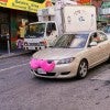 Pink Lyft mustache on a car