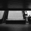 People boarding a escalator