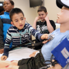 Boys playing with stethoscopes 