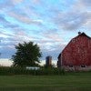 Red barn in a green field Red barn in a green field