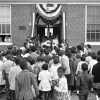 Vintage photo of students going into a school