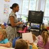 Teacher speaking to a classroom full of students