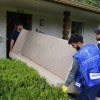 Men moving a couch