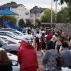 Long lines for the start of early voting snaked around the parking at the Metropolitan Multi-Service Center near downtown Houston on Monday, Oct. 22, 2018.  Michael Stravato for The Texas Tribune