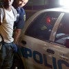 Houston police officers arrest a man