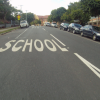 Neighborhood map with "school" written on the pavement