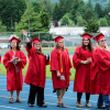 Students in graduation gowns and hats