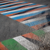 Painted crosswalk with tire marks