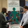Discussing job opportunities at career fair