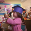 A child graduates from daycare