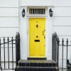 Yellow door to a house