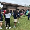 Kids in the field by St. Luke's for a fall festival