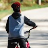 Boy riding a bike in Buffalo Bayou Park Houston