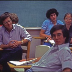 Dr. Stephen Klineberg sitting in class with students, Rice University
