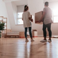 A young couple moves into a new home.