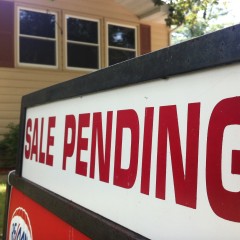 Sale Pending sign in front of home