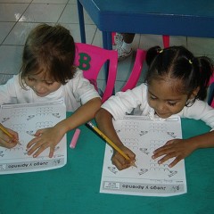 Students filling out worksheets